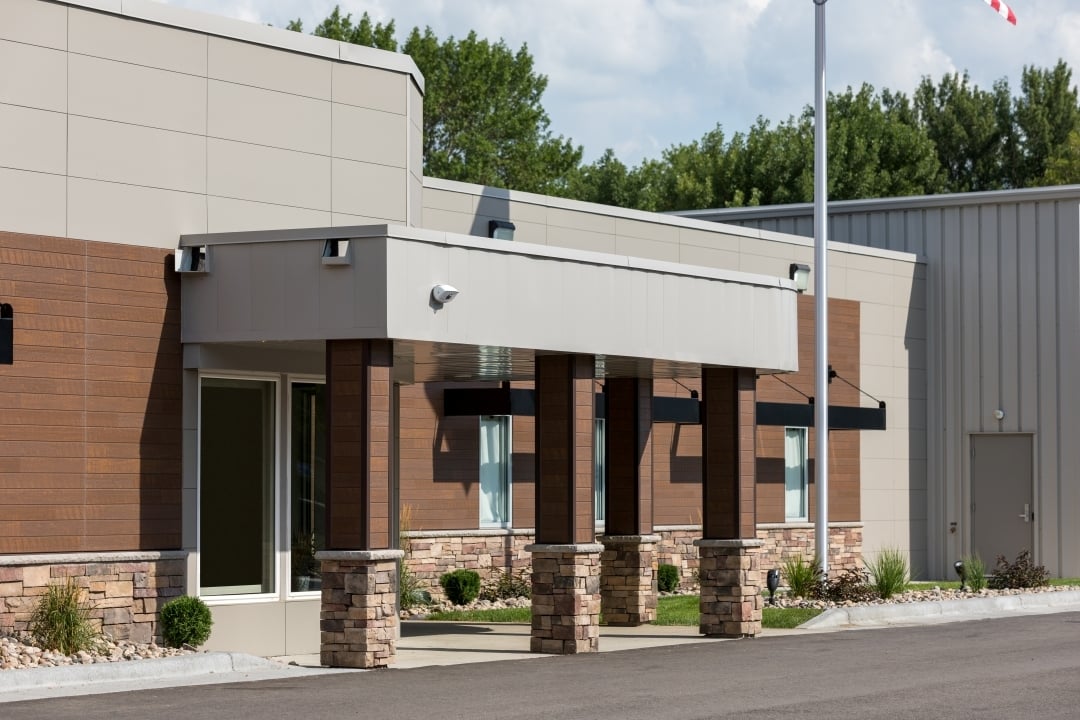 Exterior of municipal government facility showing main public entrance, constructed by Rice Companies