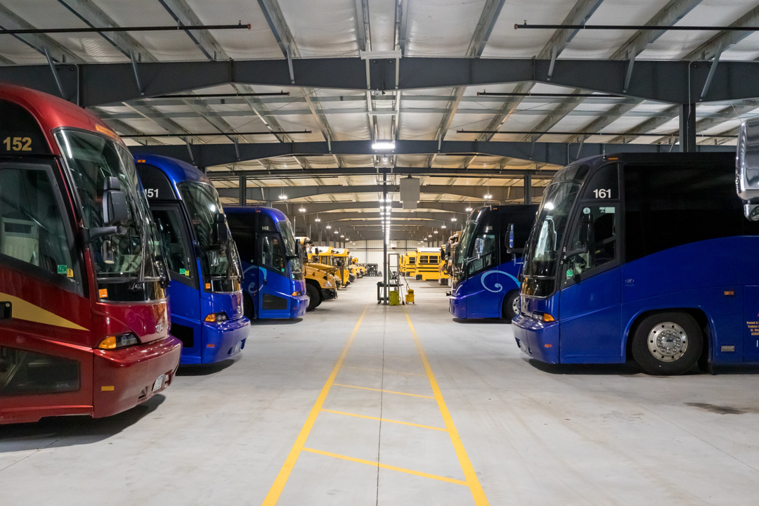 Interior of transportation facility showing bus parking garage and service lanes, constructed by Rice Companies