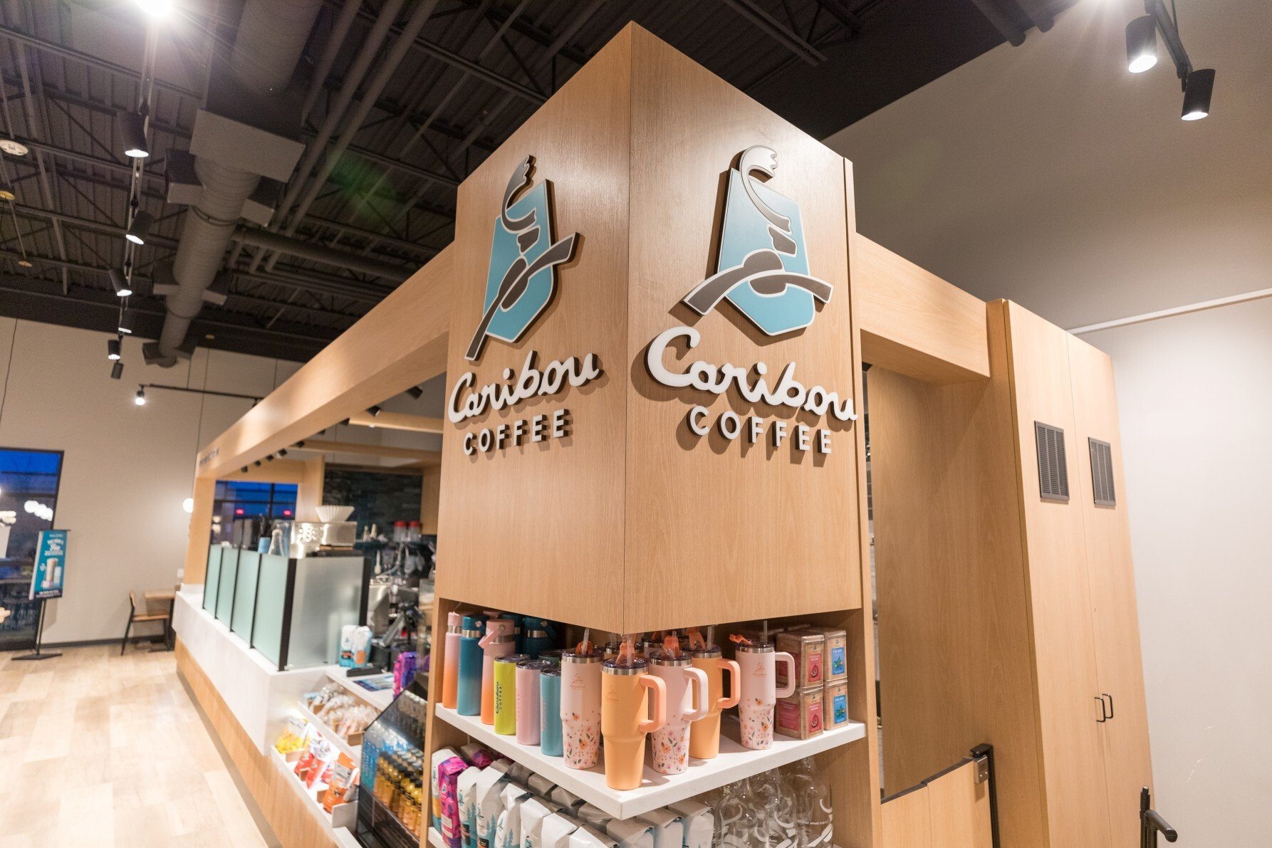Interior of Caribou Coffee showing retail display and service counter area, constructed by Rice Companies
