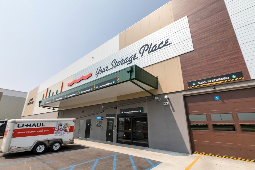 Exterior of U‑Haul storage facility with main entrance canopy and loading area, constructed by Rice Companies.