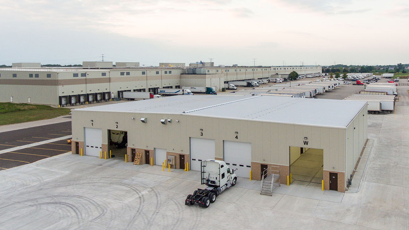Exterior of maintenance facility showing drive-through service bays, constructed by Rice Companies