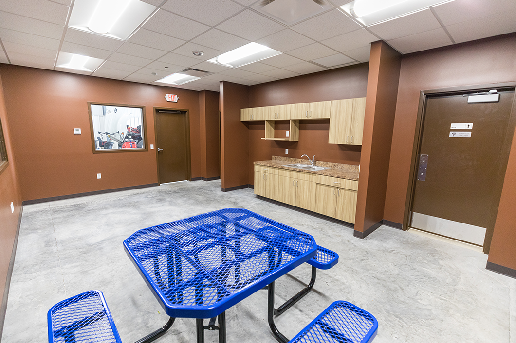 Interior of maintenance facility showing break area for staff