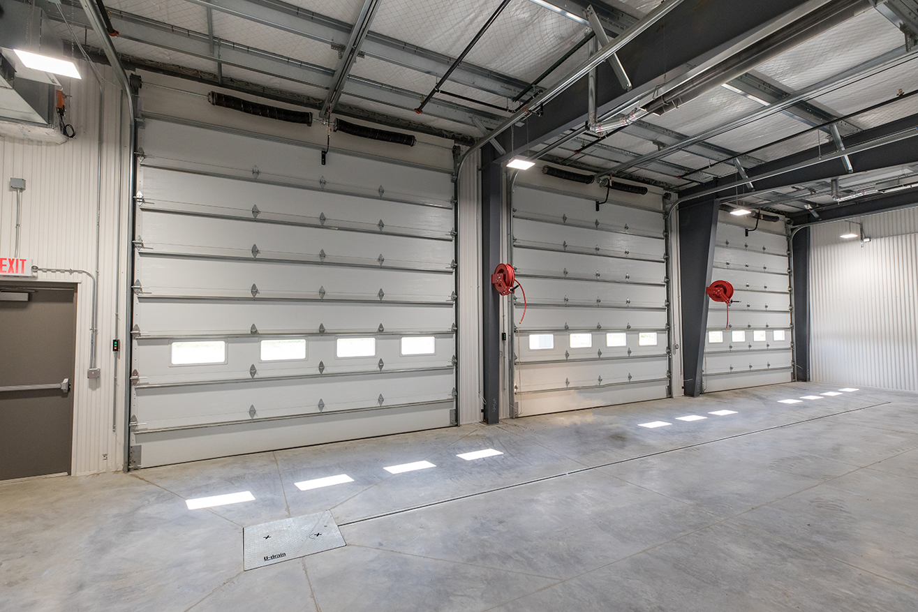 Interior of transportation facility showing bus service warehouse, constructed by Rice Companies