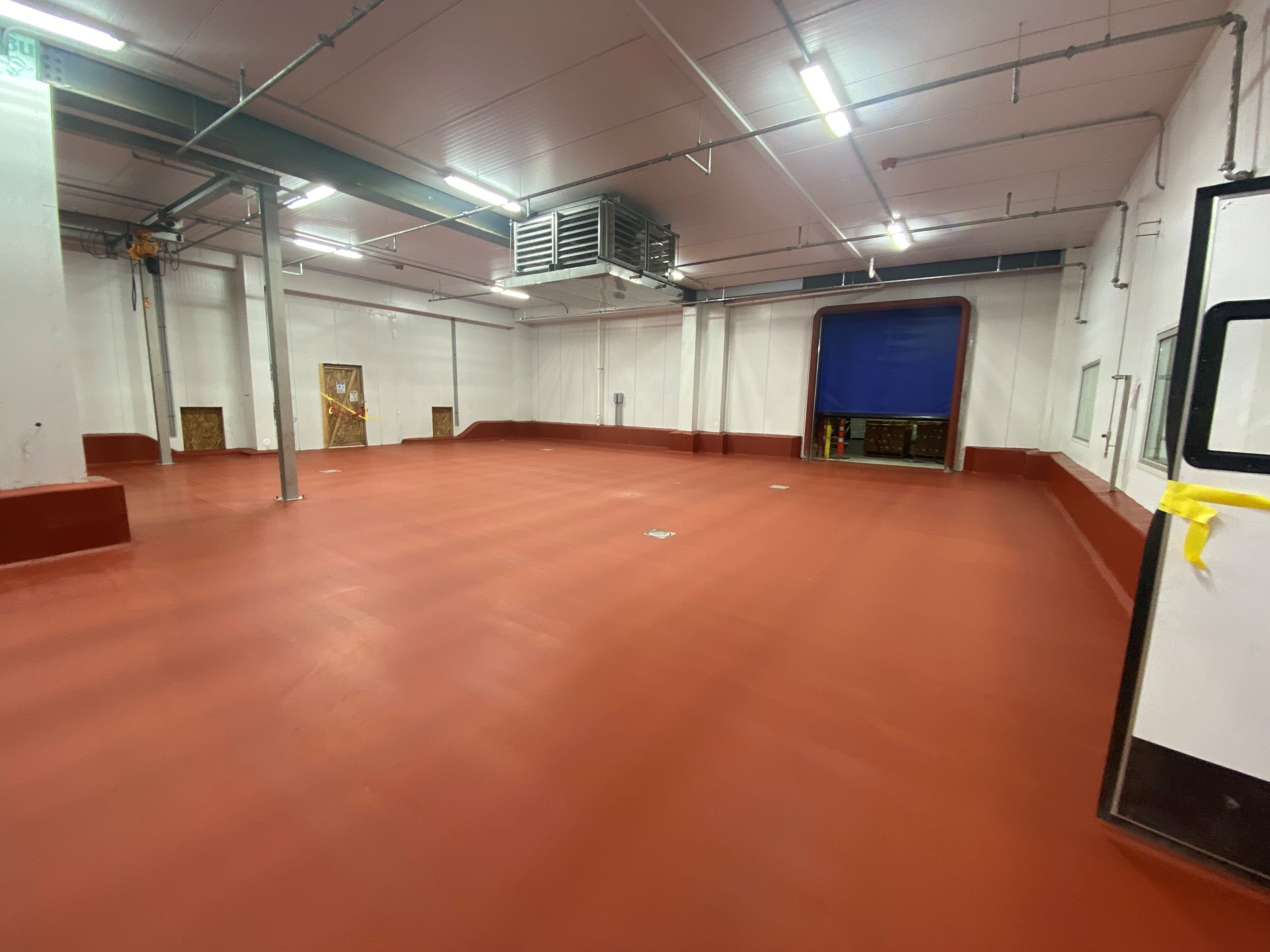 Interior of wash-down-ready food processing area with sanitary finishes, constructed by Rice Companies