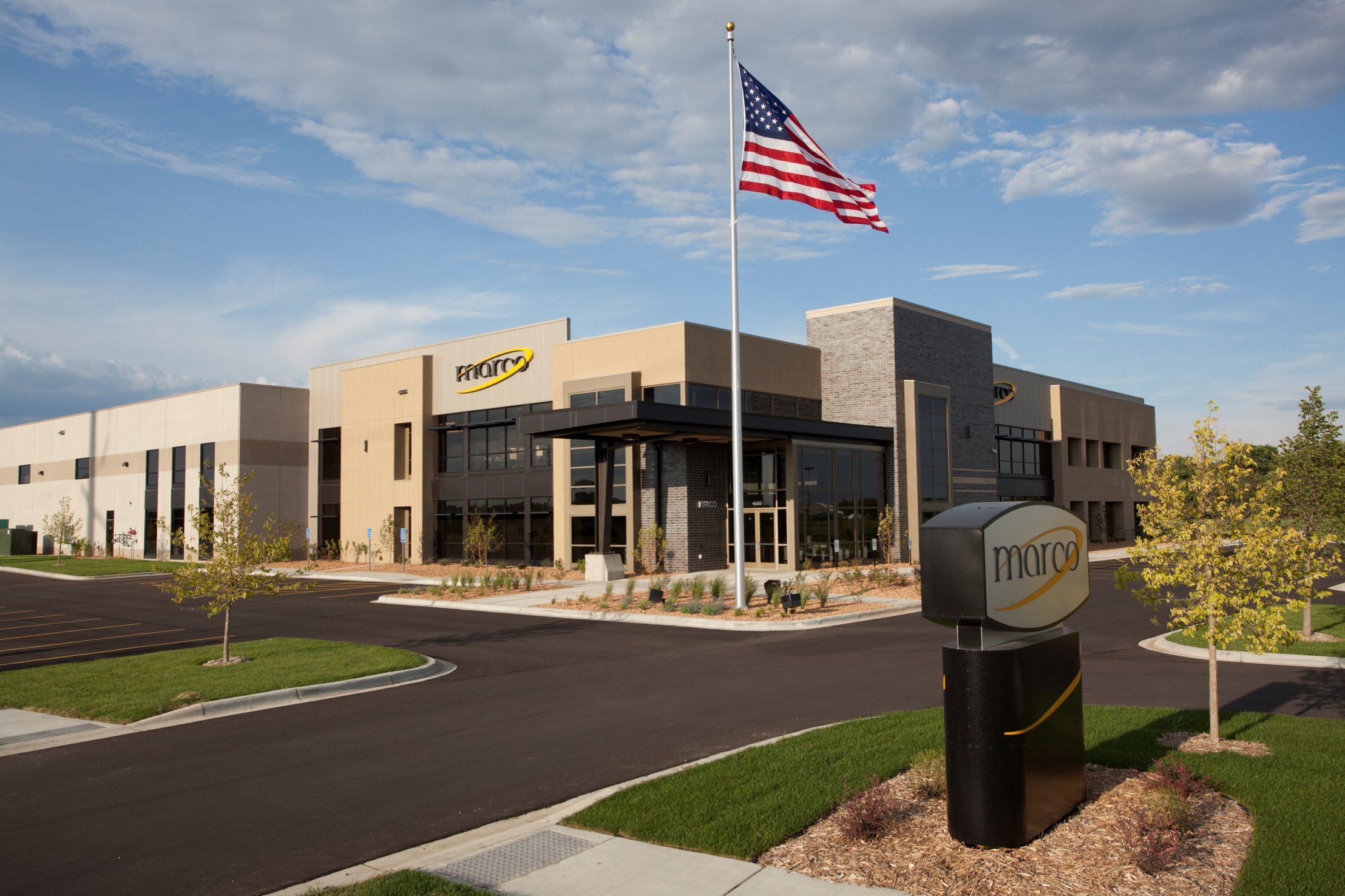 Exterior of corporate headquarters showing main entrance and landscaped site, constructed by Rice Companies
