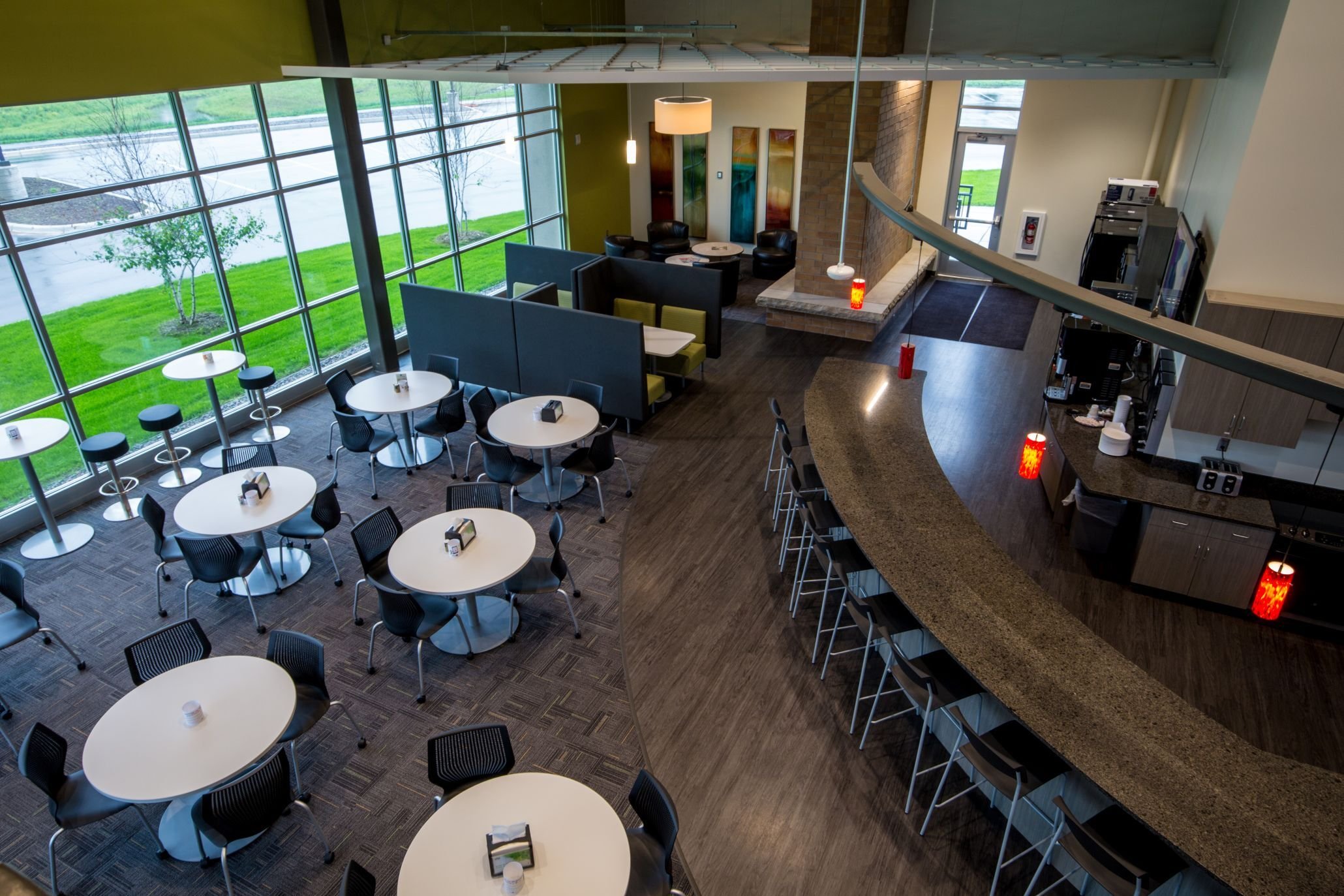 Corporate office break area with seating and large windows constructed by Rice Companies