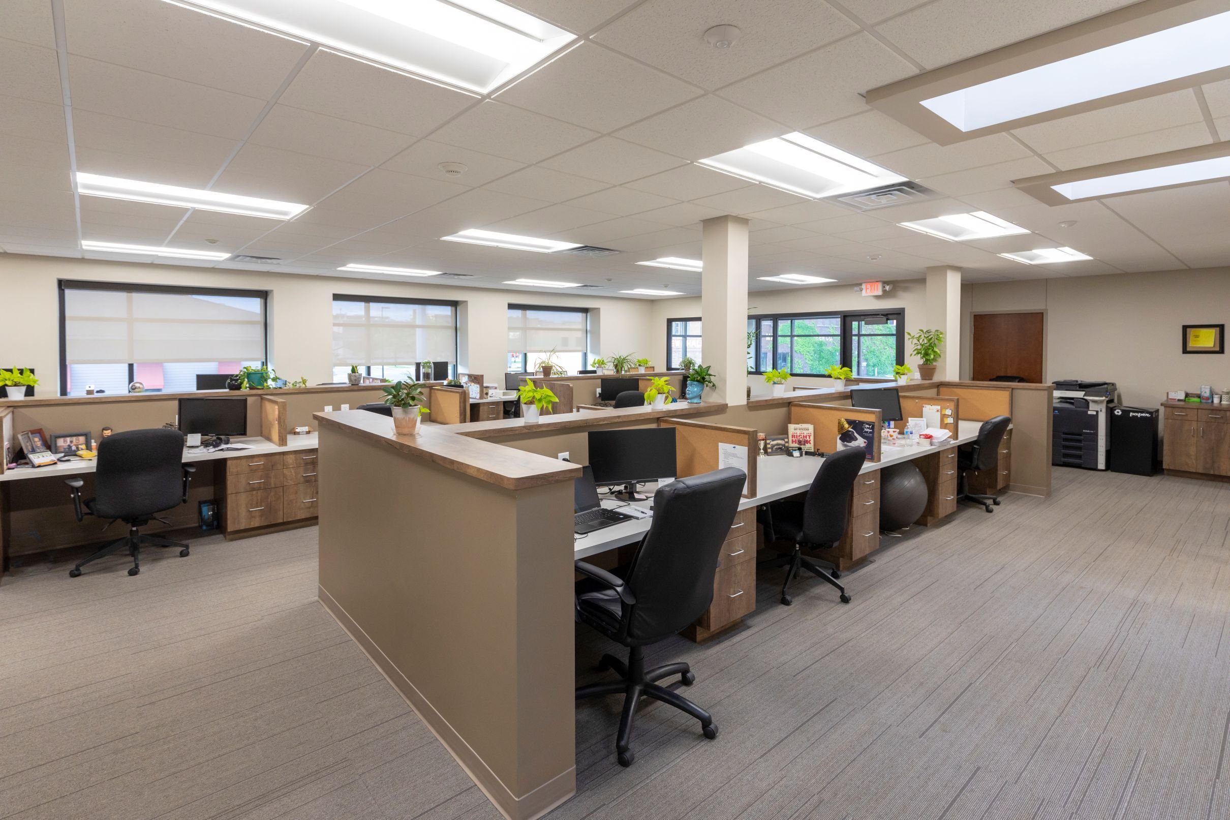 Updated open office workspace inside Dayta corporate office remodeled by Rice Companies.