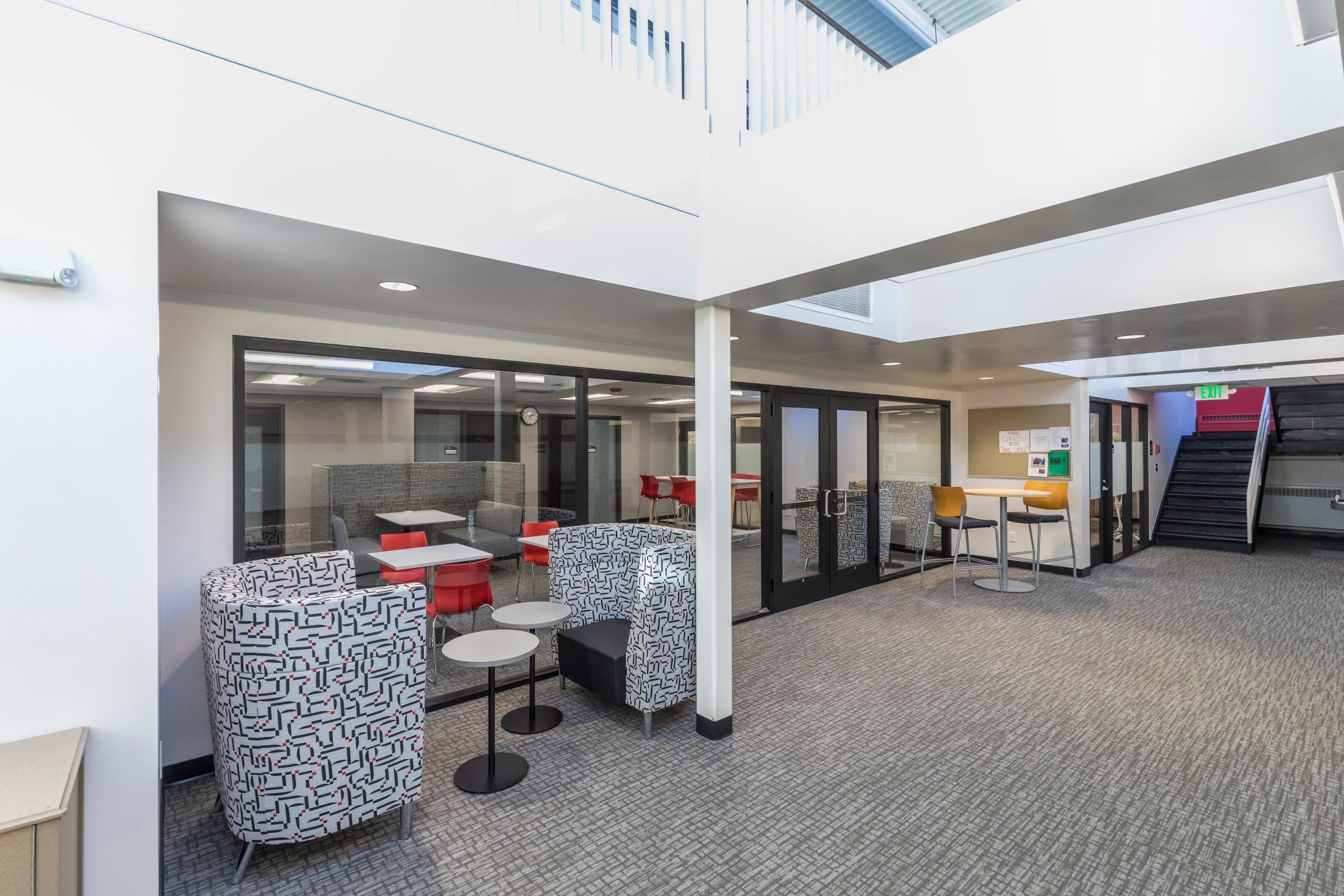Interior of renovated education facility with updated finishes and gathering areas, constructed by Rice Companies