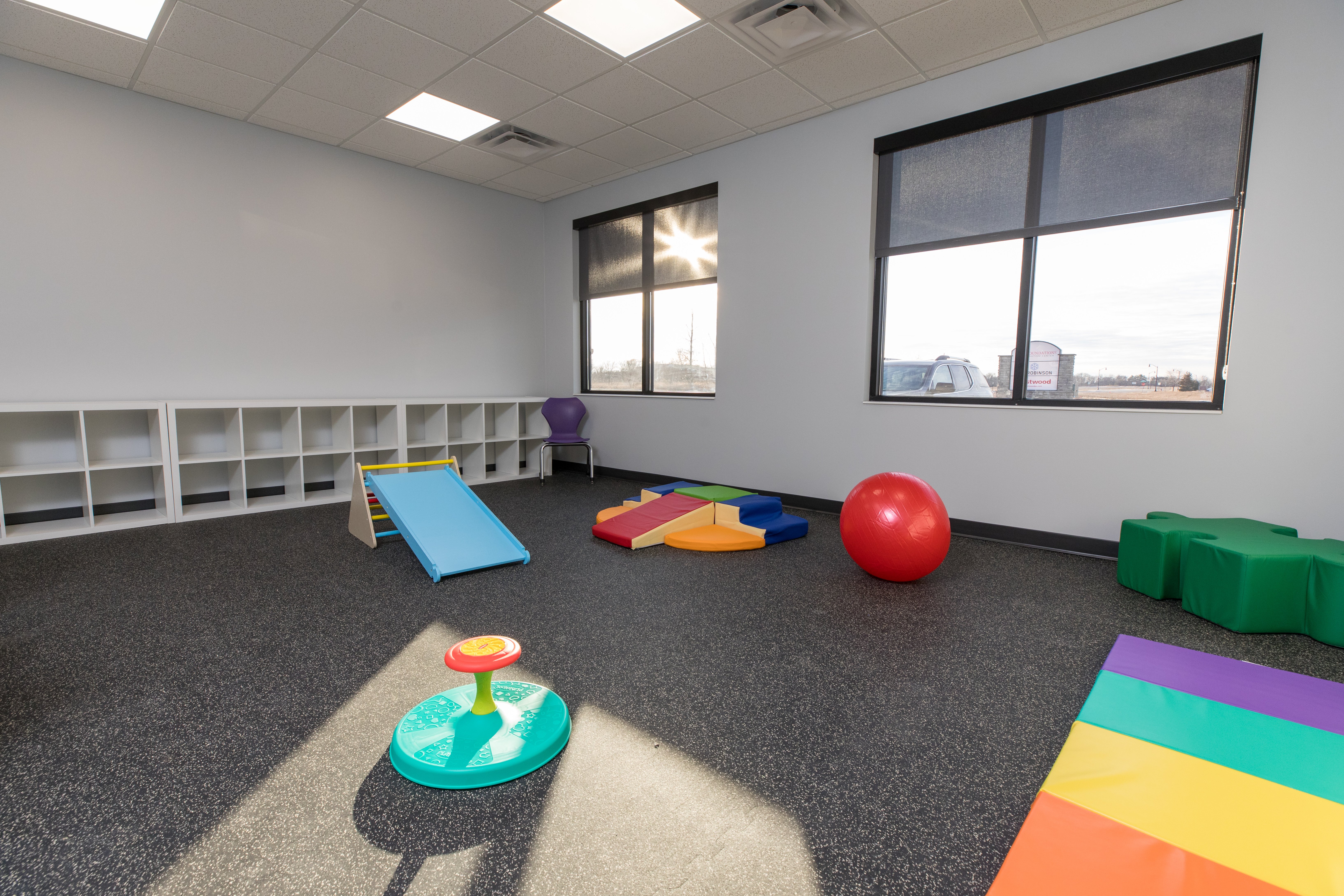Interior of behavioral health facility showing sensory-friendly play area, constructed by Rice Companies