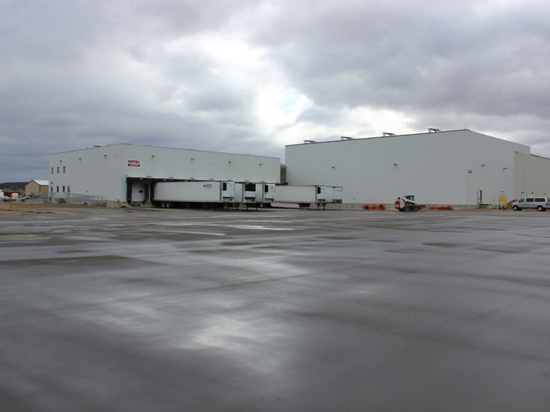 Exterior of food processing facility showing loading docks and warehouse expansion, constructed by Rice Companies