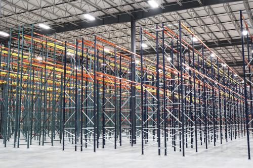 Interior of industrial distribution facility showing high-bay storage racking system, constructed by Rice Companies