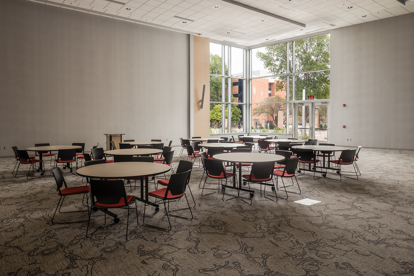 Interior of alumni center showing meeting room and flexible seating areas, constructed by Rice Companies