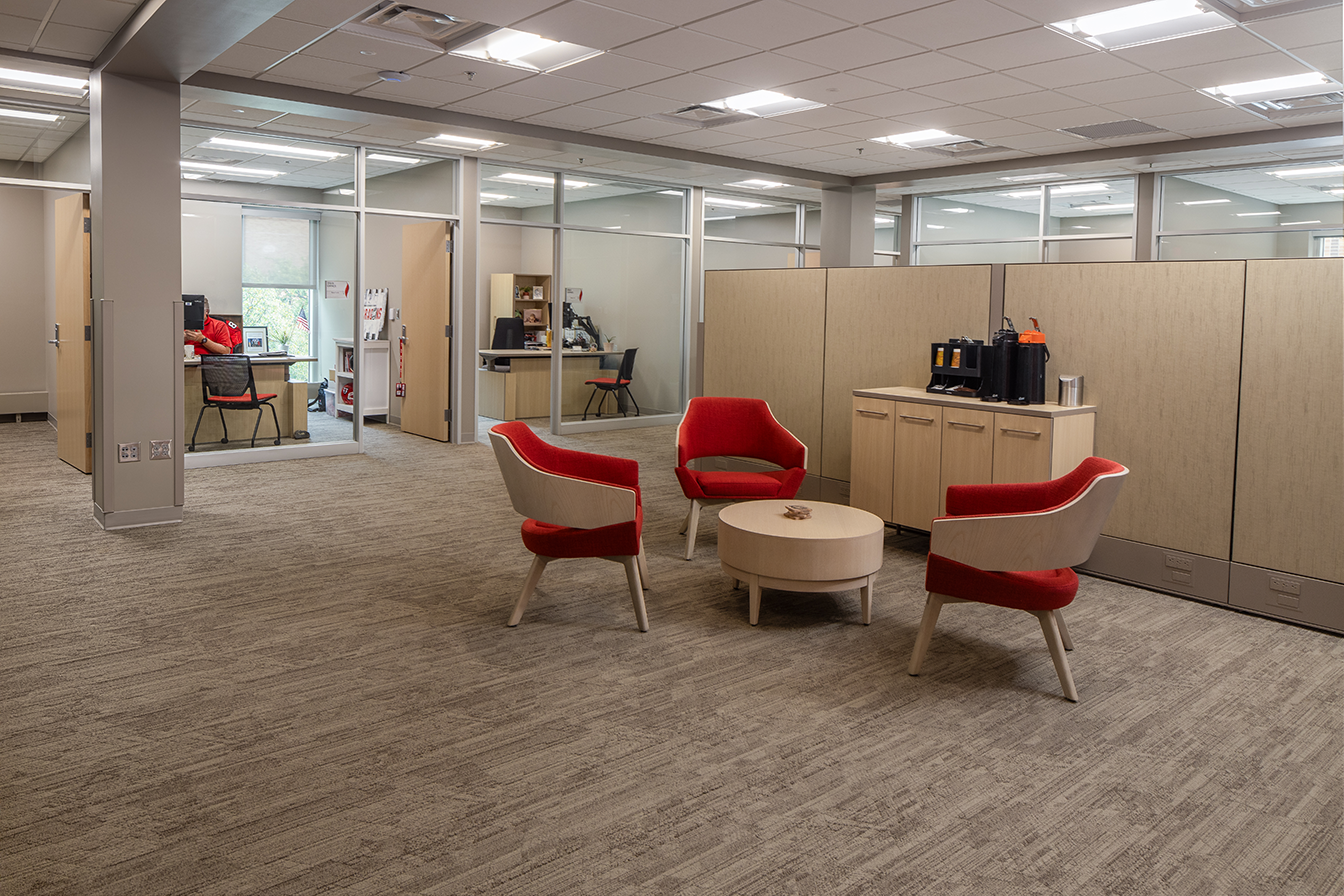 Interior of alumni center showing private offices and collaboration spaces, constructed by Rice Companies