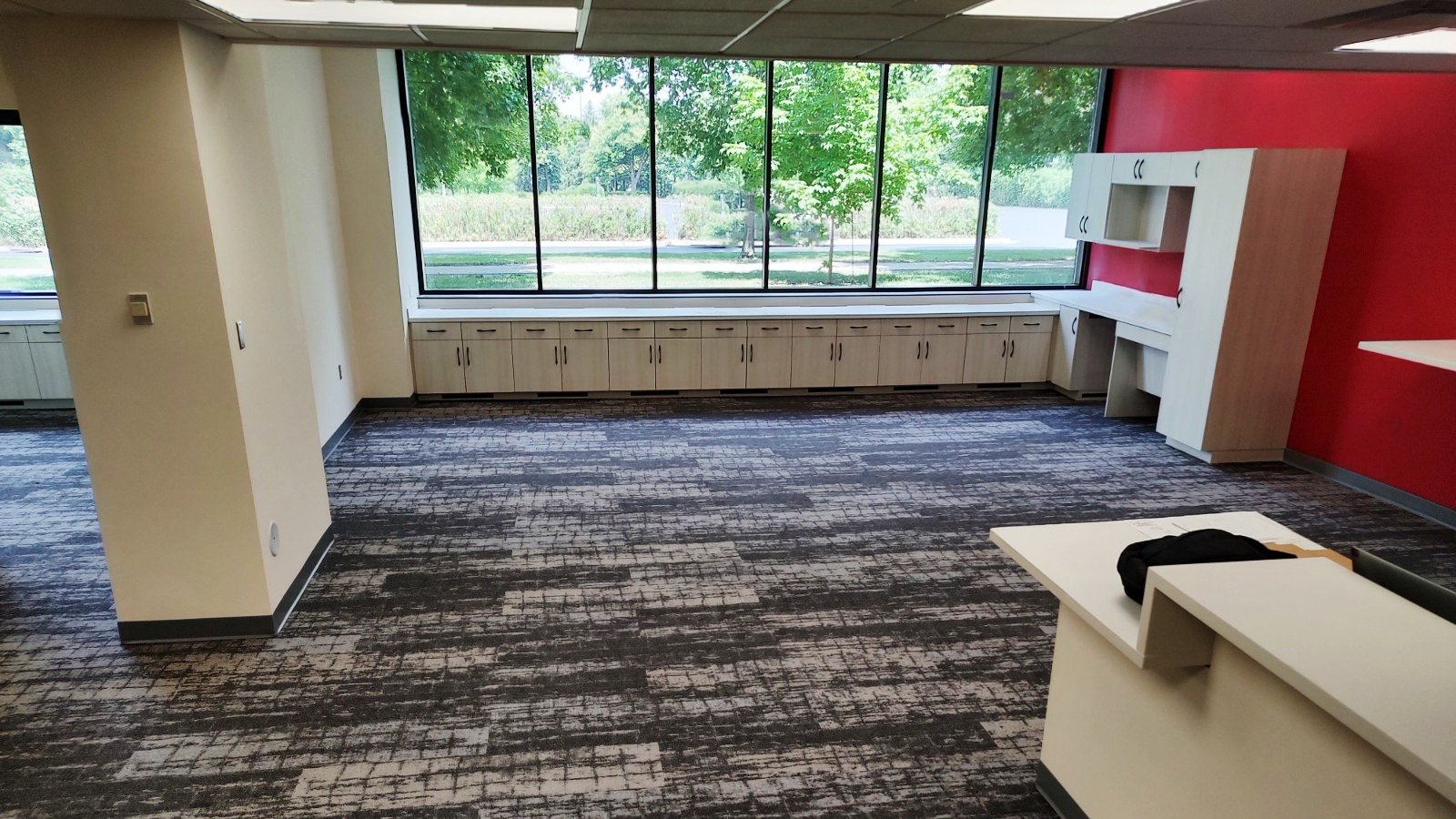 Renovated study space at Mary Hall with built-in cabinetry and updated finishes, constructed by Rice Companies