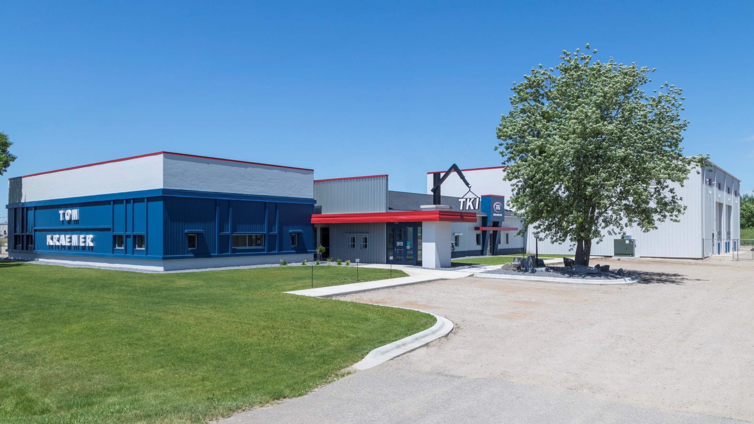 Exterior of operations and service facility with branded entrance and metal panel exterior, constructed by Rice Companies