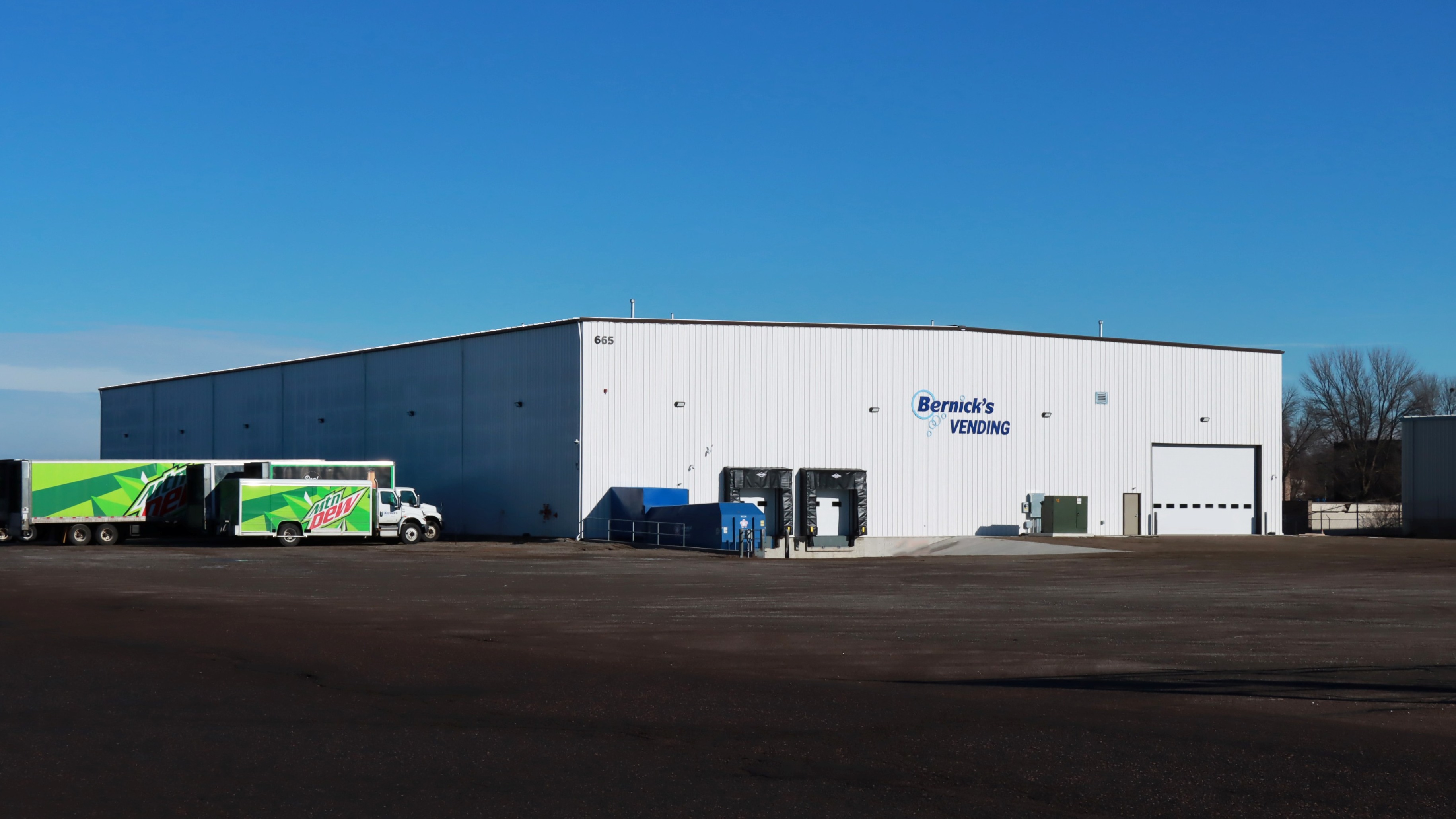 Exterior of warehouse and freezer distribution facility with loading docks, constructed by Rice Companies