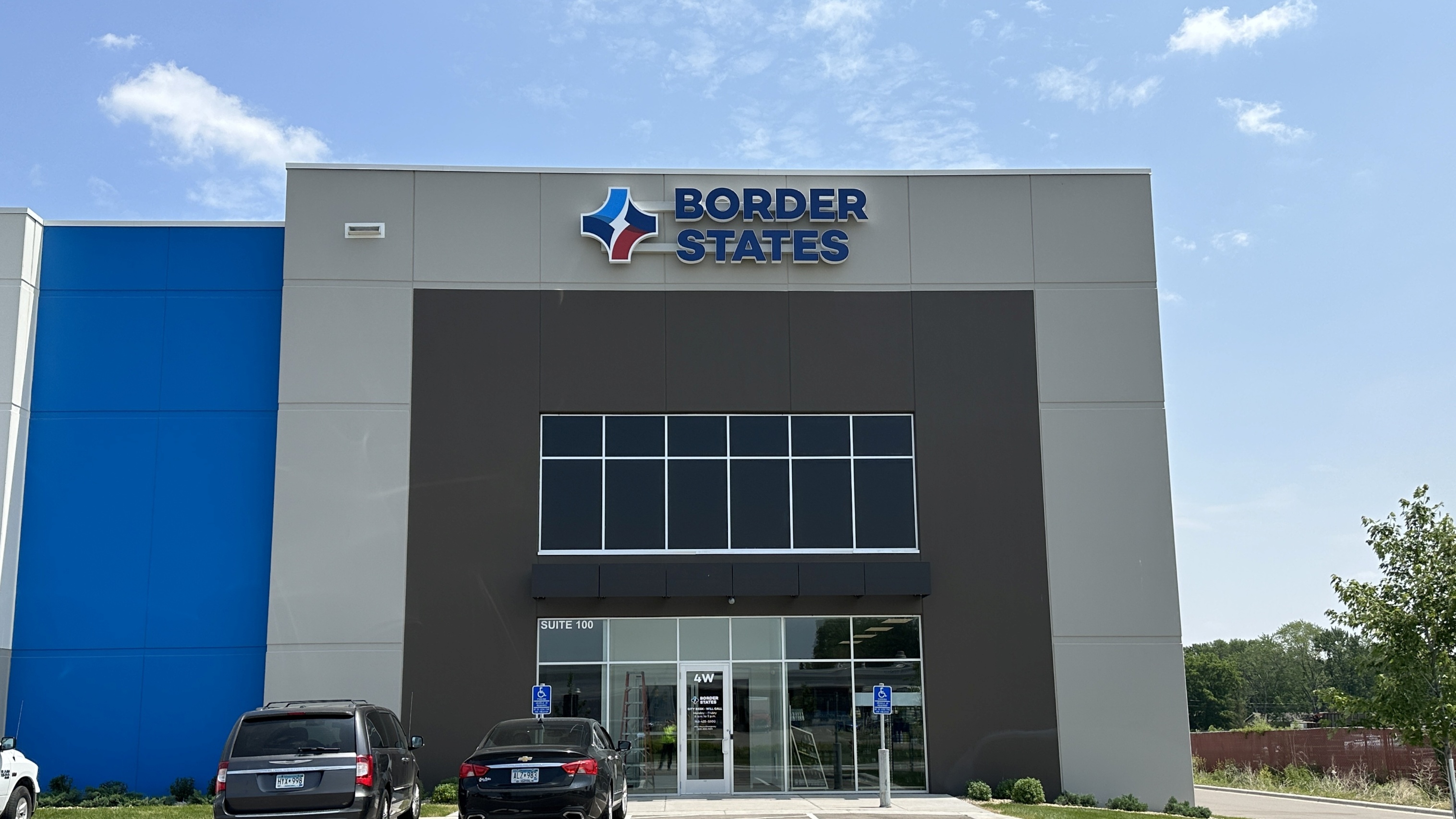 Exterior of Border States warehouse and office building with branded facade and storefront windows, constructed by Rice Companies