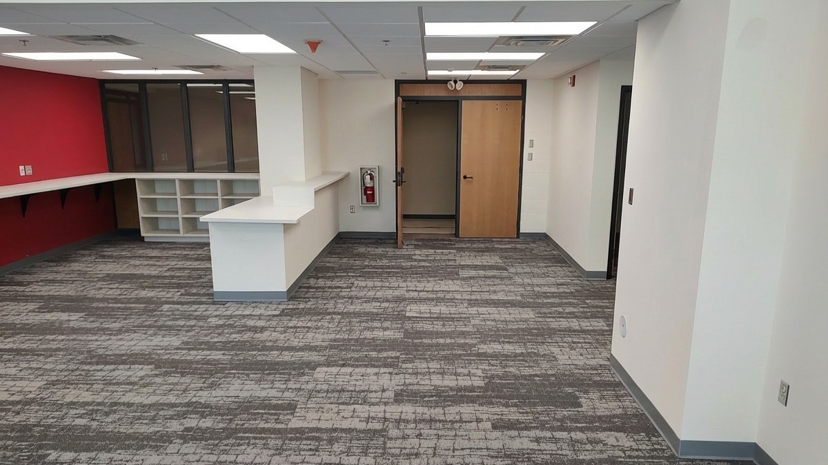 Renovated academic space at Mary Hall featuring new front desk and updated finishes, constructed by Rice Companies