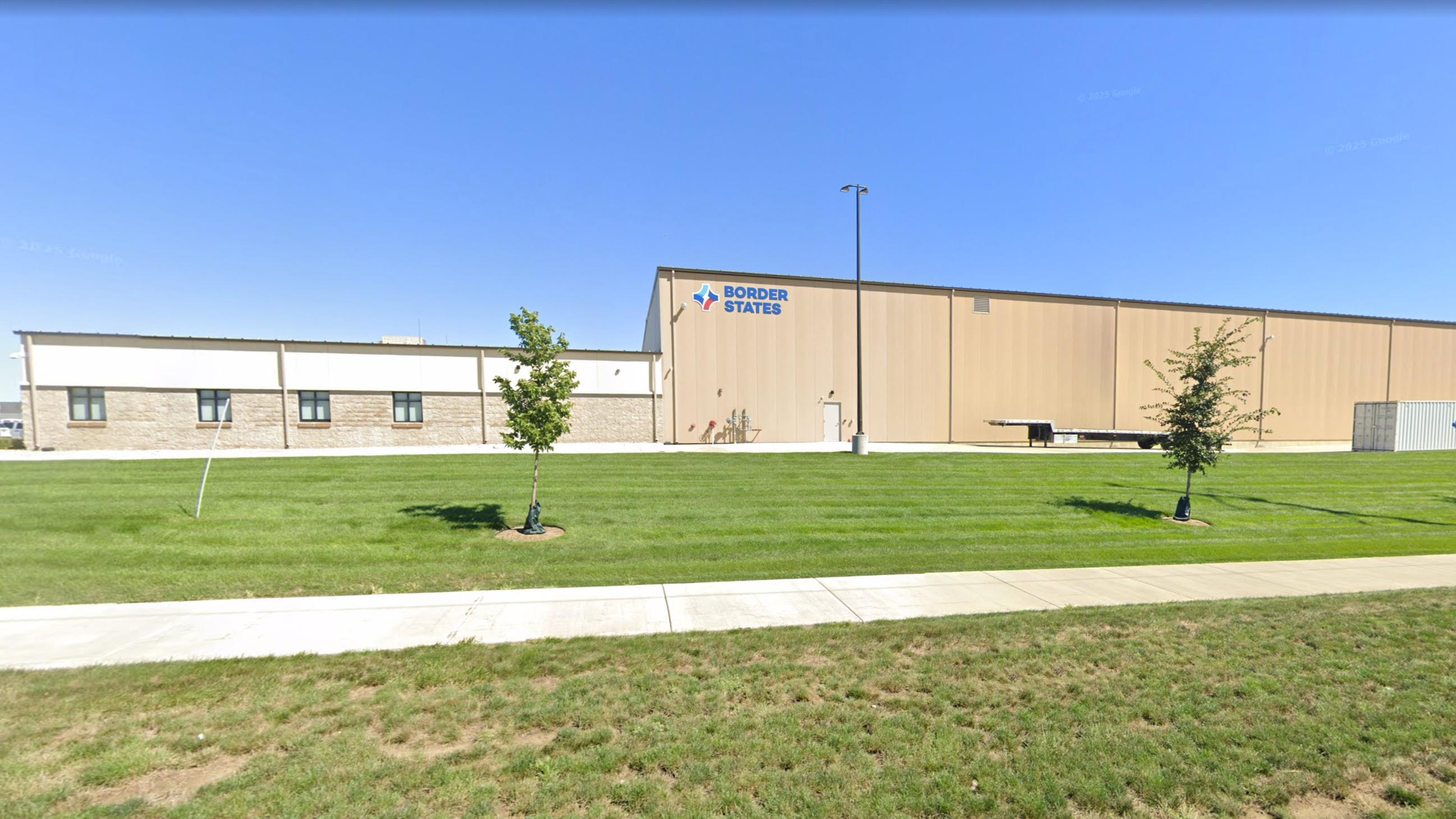 Exterior view of the Border States facility in Sioux Falls with building signage and landscaped grounds, constructed by Rice Companies.