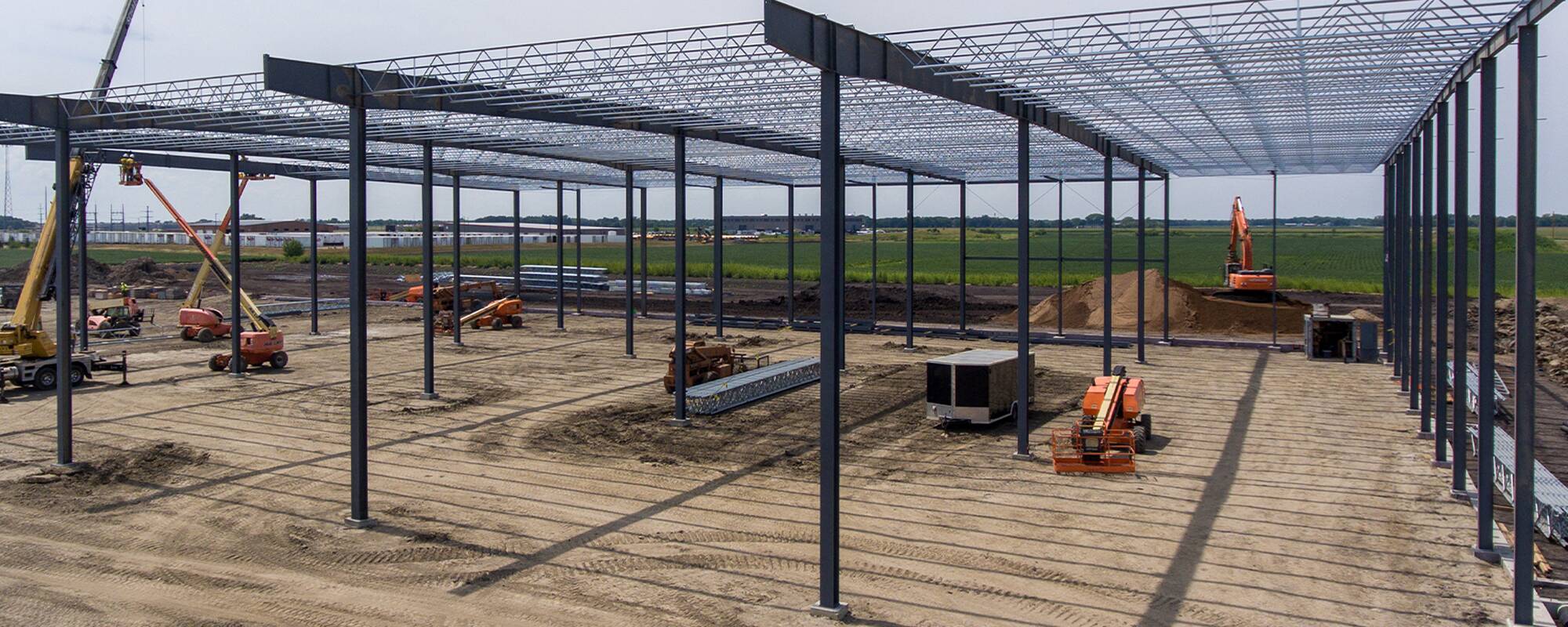 Foundation and beams holding up the mesh roofing