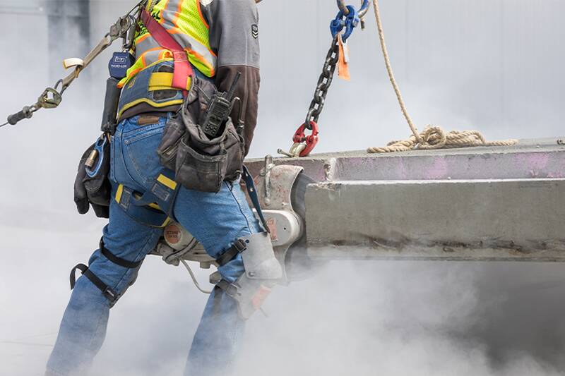 Employee lifting some concrete