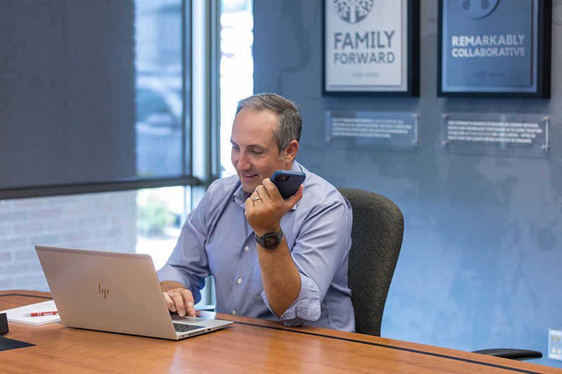 Professional man in conference room on phone