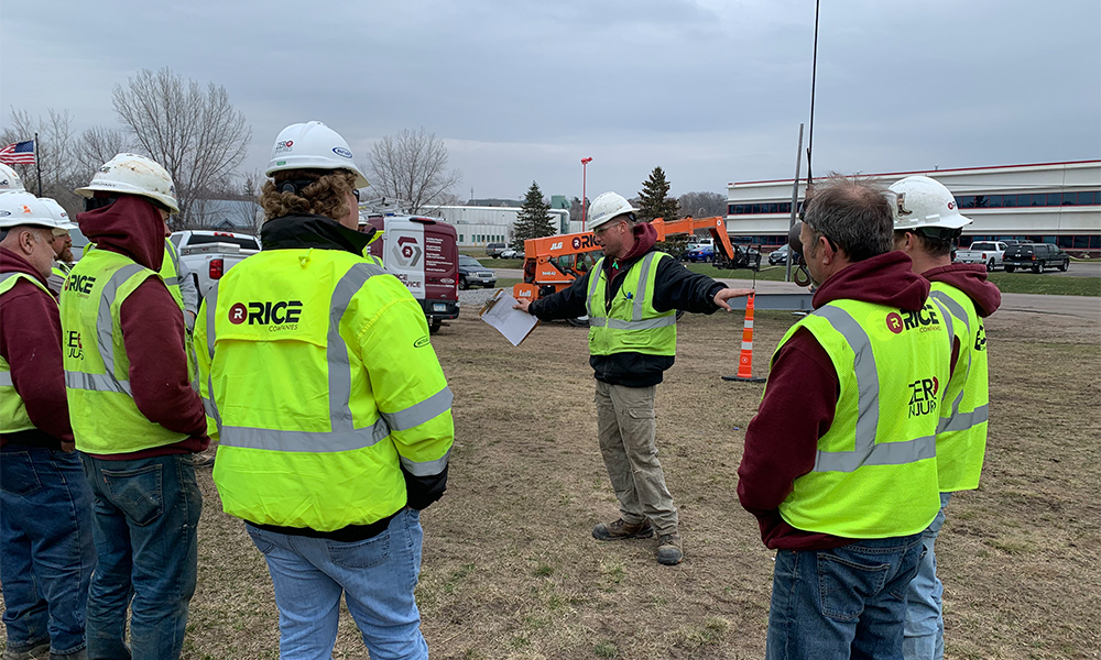 Group of construction workers in safety vests